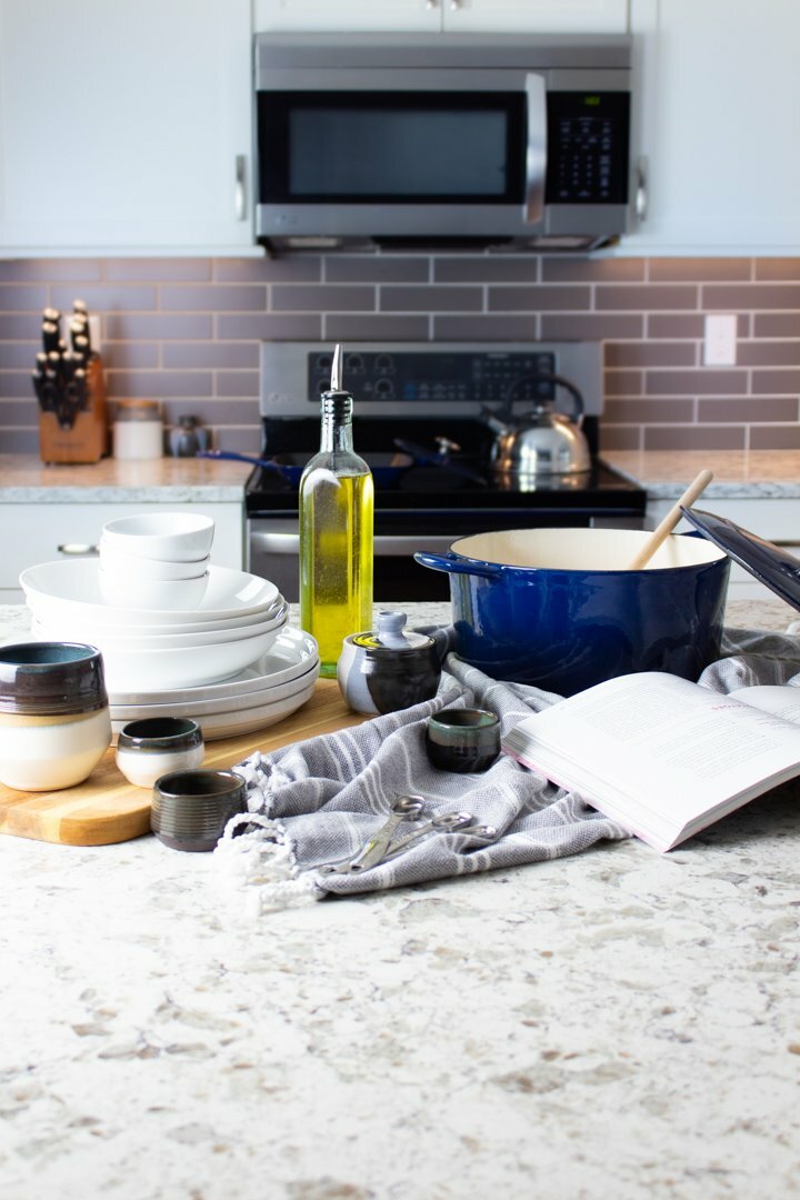 Kitchen with meal prep supplies on the counter.