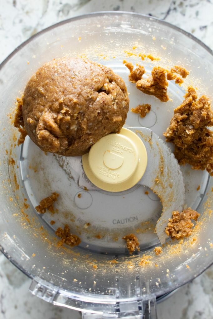 Overhead shot of Chai Bliss Balls after being combined in a food processor.