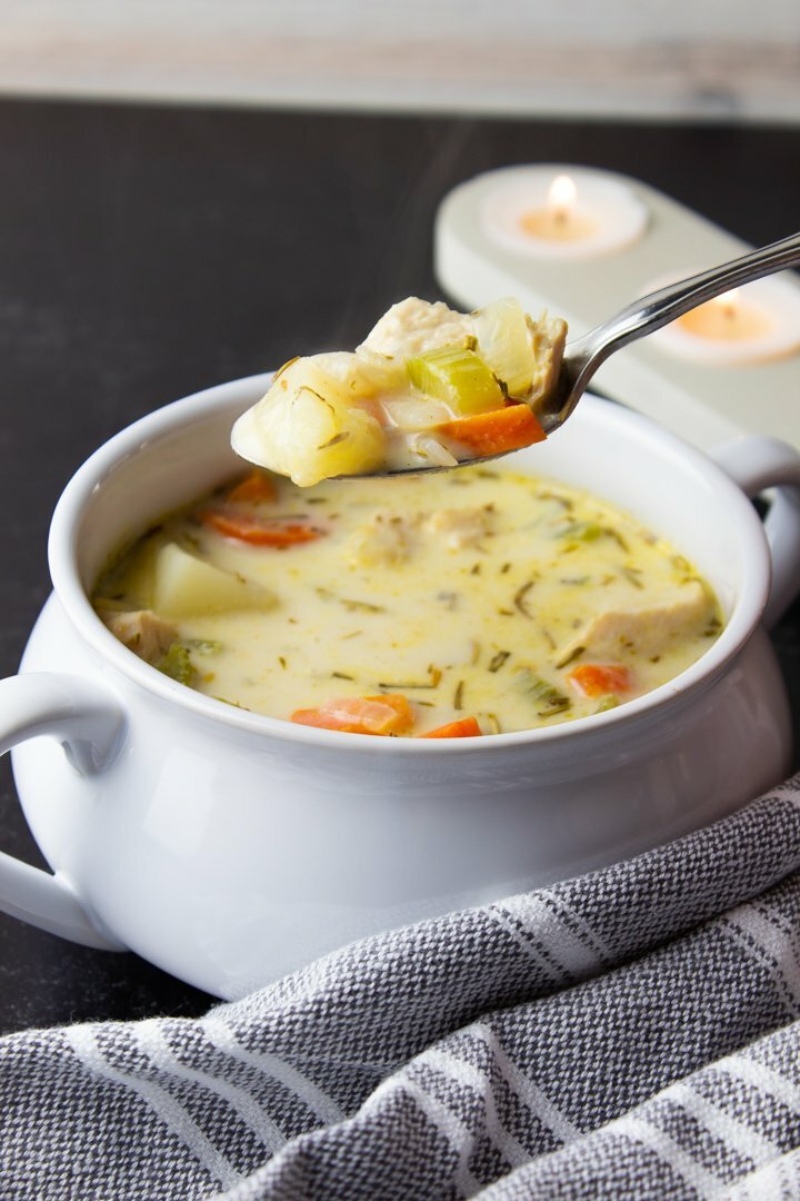 A spoonful of Creamy Turkey Pot Pie Soup.