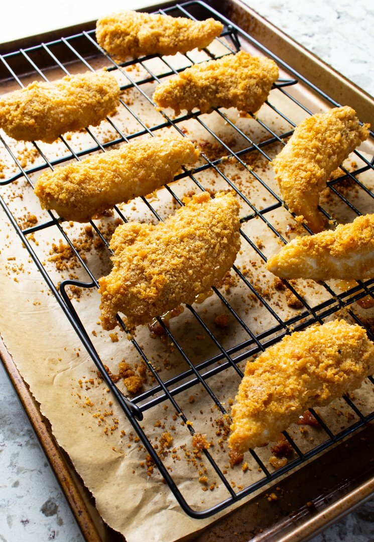 Oven-Baked AIP Chicken Tenders on a sheet pan.