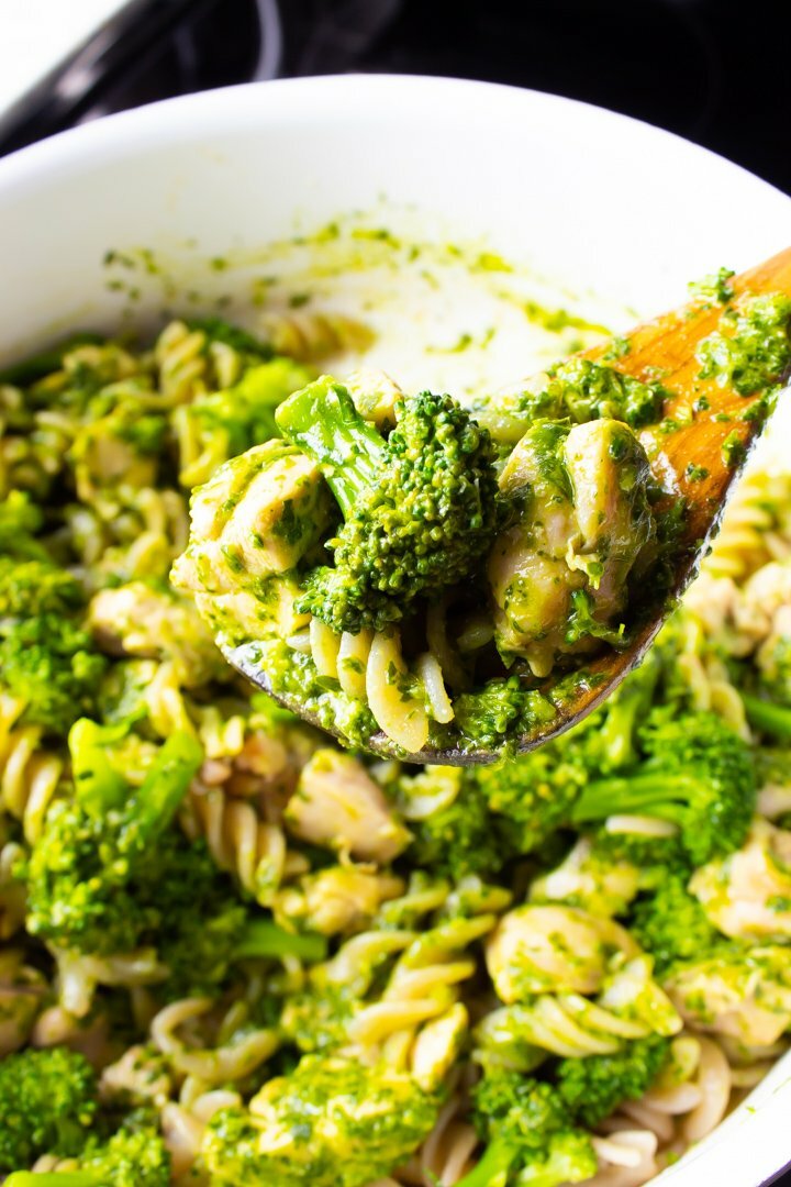 Close up of Kale Pesto Pasta on a wood spoon.